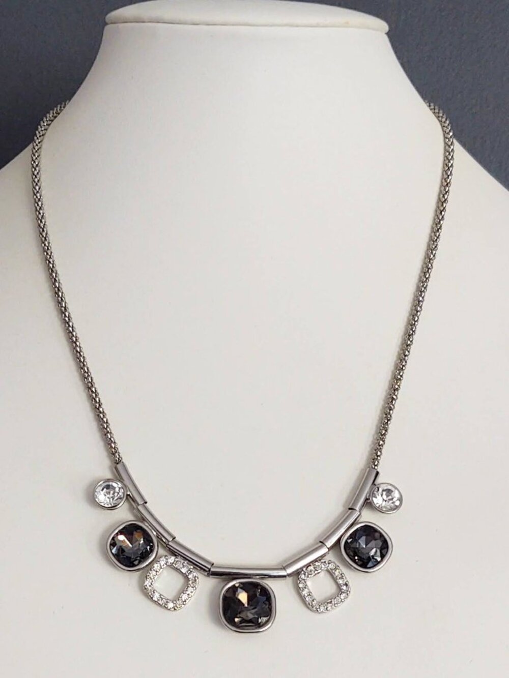 Silver necklace with gray and clear crystals